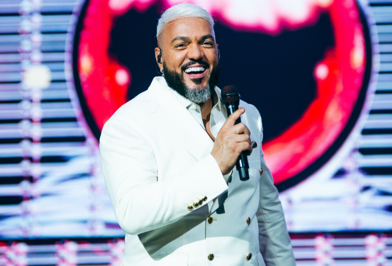 Belo encara desafio e entra para reality show
